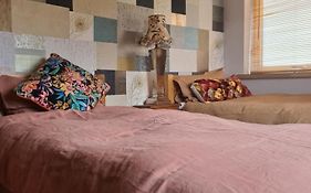 Twin Beds With Private Bathroom At Fir Tree Lodge